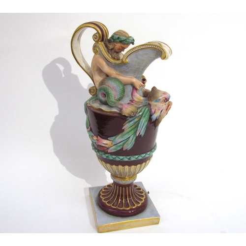 6052 - A pair of late 19th/early 20th Century Naples jugs with Merman and Pan to spout, 40cm tall, approx 2... 