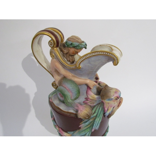 6052 - A pair of late 19th/early 20th Century Naples jugs with Merman and Pan to spout, 40cm tall, approx 2... 