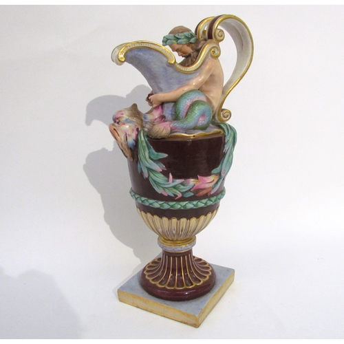 6052 - A pair of late 19th/early 20th Century Naples jugs with Merman and Pan to spout, 40cm tall, approx 2... 