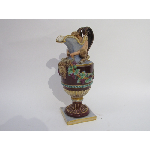 6052 - A pair of late 19th/early 20th Century Naples jugs with Merman and Pan to spout, 40cm tall, approx 2... 