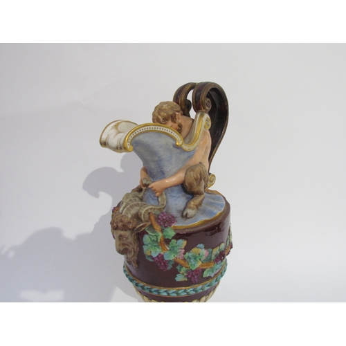 6052 - A pair of late 19th/early 20th Century Naples jugs with Merman and Pan to spout, 40cm tall, approx 2... 