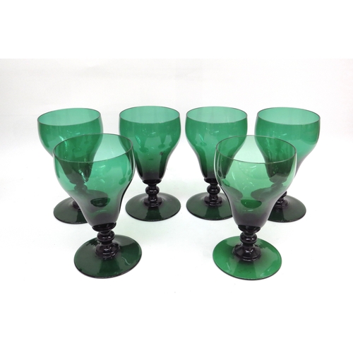 6065 - WITHDRAWN: A late 19th Century green facet decanter and six green glasses of large proportions, 15.5... 