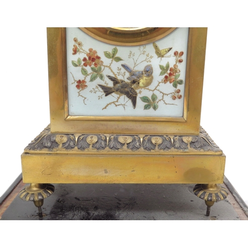 6076 - A Waterhouse & Co brass and enamel French clock garniture with bird detail, back open, 37cm x 18cm