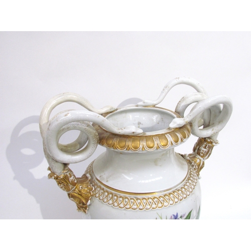 6201 - An early to mid 20th century porcelain urn, the twin serpent handles with gilt embellishment, floral... 