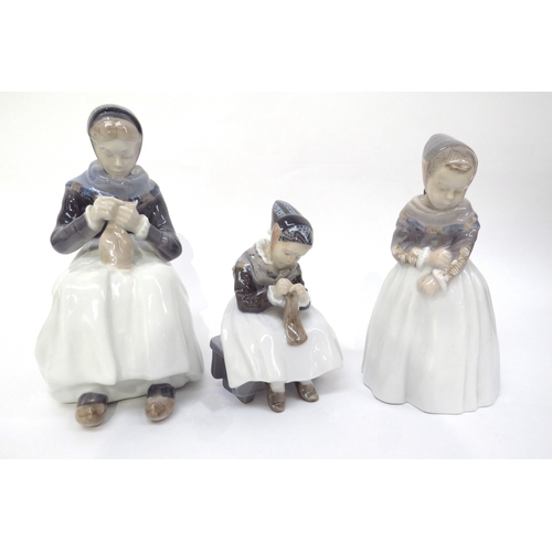 6270 - Three Royal Copenhagen Amager dress figures, 23.5cm x 20cm and 15.5cm