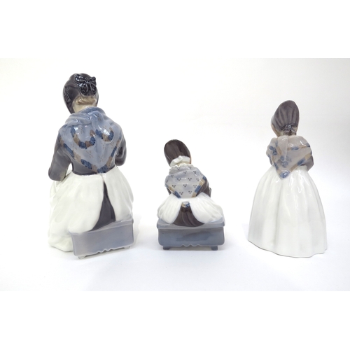 6270 - Three Royal Copenhagen Amager dress figures, 23.5cm x 20cm and 15.5cm