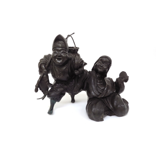 6277 - A 20th Century bronze figural group, 'Heading to Market'. 23cm x 31cm