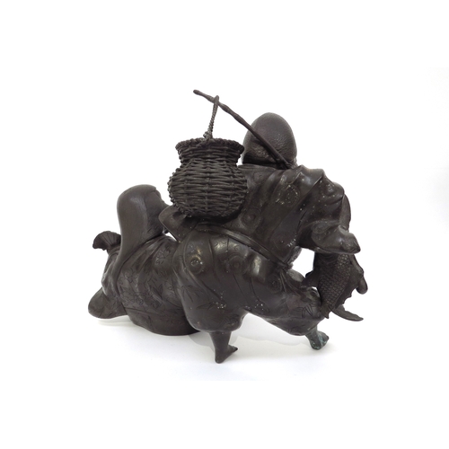 6277 - A 20th Century bronze figural group, 'Heading to Market'. 23cm x 31cm