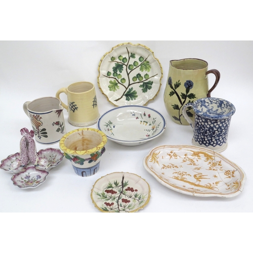 6305 - Mixed French Faience ceramics including jugs, mugs, dishes, plates and dolphin dish, some items with... 