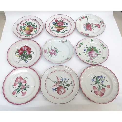 6307 - Nine 19th Century French Faience plates decorated with flowers and vases, two staple repaired approx... 