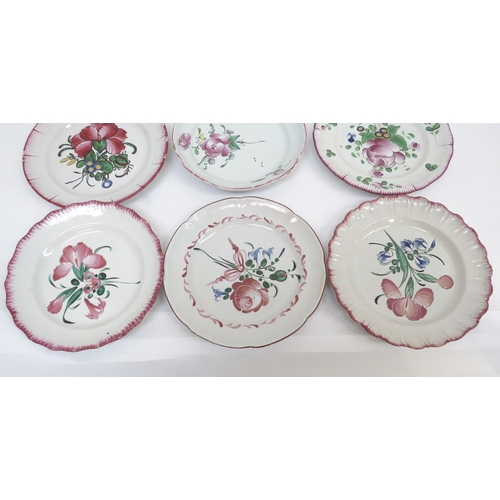 6307 - Nine 19th Century French Faience plates decorated with flowers and vases, two staple repaired approx... 