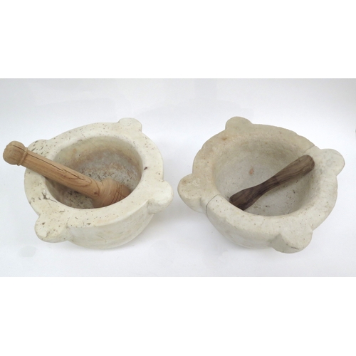 6308 - WITHDRAWN: Two large marble mortars with wooden pestles one with cracks to side approximately 30cm i... 