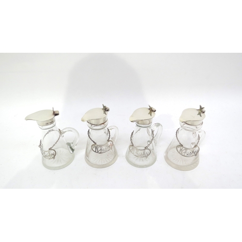 6322 - Four glass whisky noggins with silver tops (Levi & Salaman, Birmingham, 1921) with cut-out silver wh... 