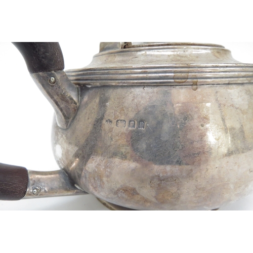 6480 - A Silver teapot with ebony knop and handle, London 1930 makers mark rubbed, 694g