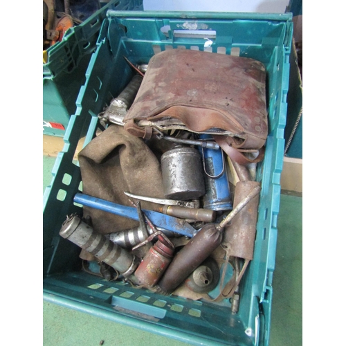 3435 - A box of oil and grease cans