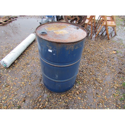 3292A - A metal oil drum with part contents     (E) £5-8