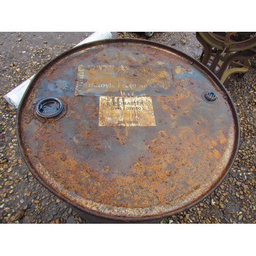 3292A - A metal oil drum with part contents     (E) £5-8