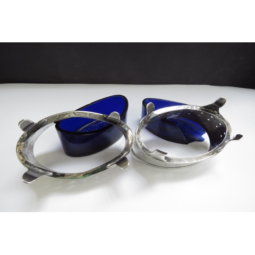 6365 - A pair of John Emes silver salts, pierced and etched decoration, London 1799, one blue glass liner a... 