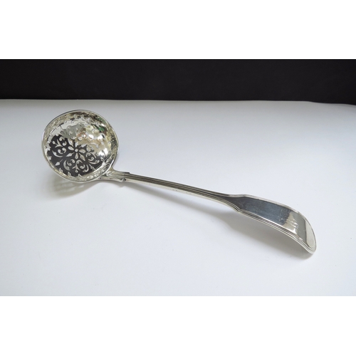 6367 - An early Victorian silver sifting spoon, makers mark rubbed, London 1861, 52g