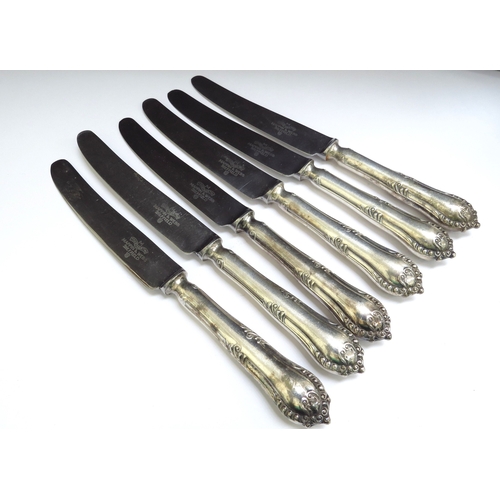 6372 - A set of six Mappin and Webb table knives