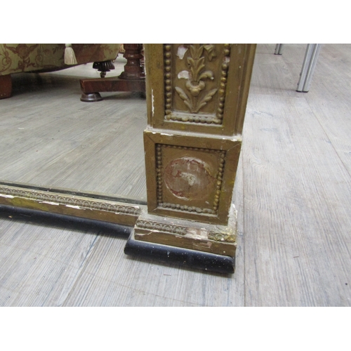 6207 - A 19th century gilt an gesso overmantel mirror with ribbon and swag detail, some gesso elements miss... 