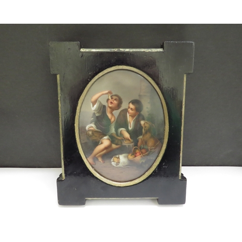 6418 - A 19th Century Continental porcelain oval panel painted with scene of two young boys with dog and ba... 