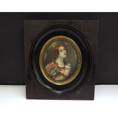 6419 - A Mid 19th Century miniature watercolour on ivory oval panel, after Carlo Dolci Maria Magdalina, set... 