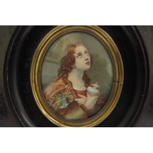 6419 - A Mid 19th Century miniature watercolour on ivory oval panel, after Carlo Dolci Maria Magdalina, set... 