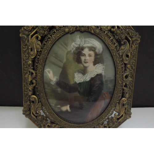 6420 - A Mid 19th Century miniature watercolour on ivory oval panel depicting young female artist with pale... 