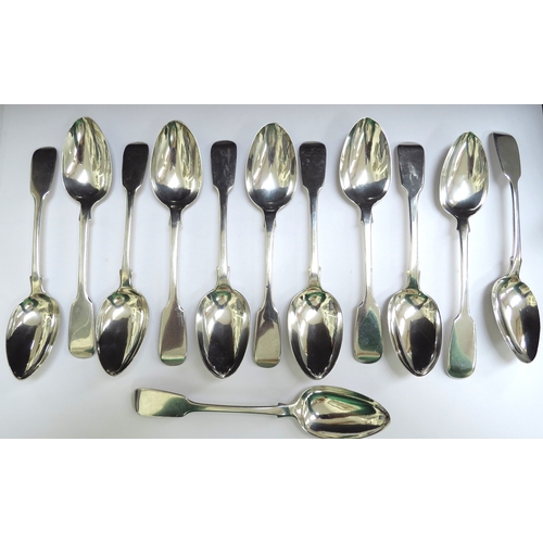 6425 - A matched set of twelve silver dessert spoons, including six Henry Holland, London 1862, five Benoni... 