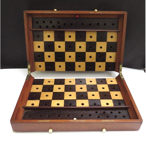 6426 - A Jacques London mahogany cased travelling chess set with stained red bone and natural pieces, gilt ... 