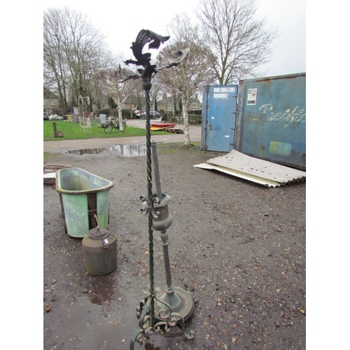 3457 - A twisted iron stand on a mixed metal standard lamp base