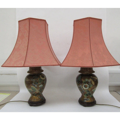 6203 - WITHDRAWN A pair of decorative lustre ceramic table lamps with butterfly detail, 64cm tall with shad... 