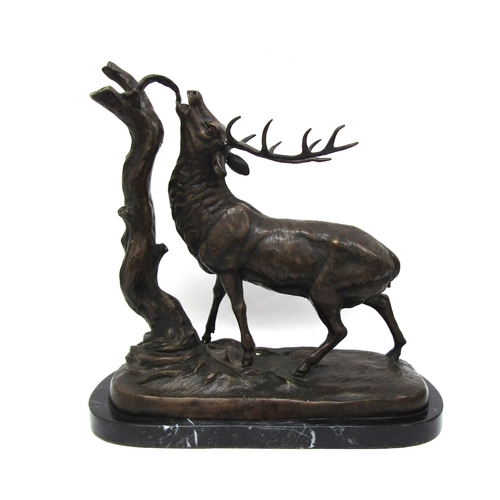 6206 - A hollow cast bronze of a stag by a tree, on marble base. Unsigned, 41cm x 40cm  (E)  £150-250