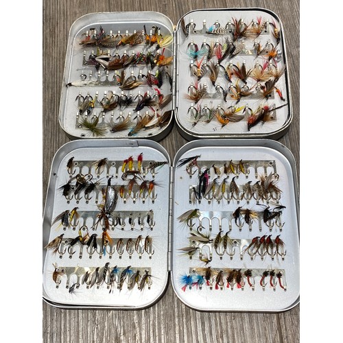 6506 - Five fly tins containing flies for trout, including feather