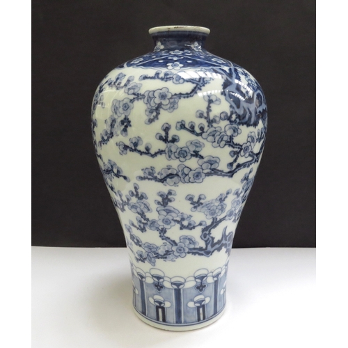 6335 - A Chinese underglazed blue and white Mei-Pei vase with six character marks to base, 23cm tall