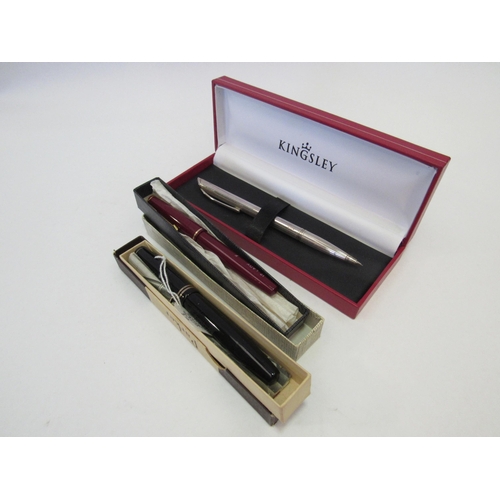 1314 - A Parker Victory fountain pen 14ct nib, boxed, a Parker red fountain pen 