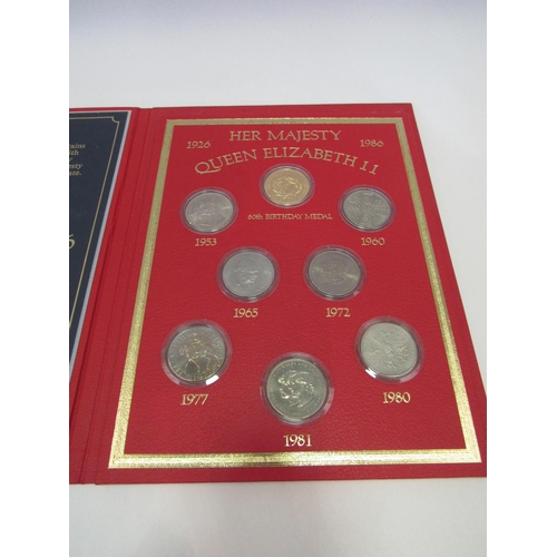 1318 - Two folders of coin collections commemorating Her Majesty Queen Elizabeth II both birthday 1926 - 19... 