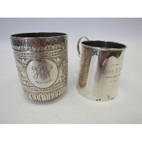 1327 - Two silver christening mugs, plain form and scrolled foliate design, 154g