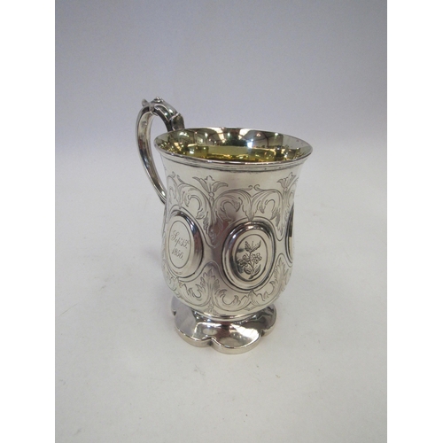 1330 - A Henry Wilkinson & Co silver tankard with oval cartouche design, scrolled foliate engraved, scroll ... 