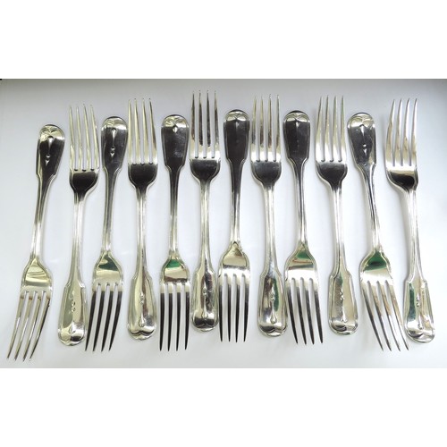 6421 - A matched set of twelve silver dinner forks including 7 Chawner and Co London and five others, all w... 