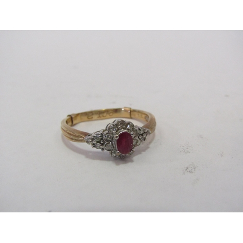 1286 - A 9ct ruby and diamond set ring, weight 2.3g