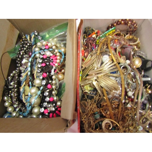 1300 - Four boxes of mixed costume jewellery