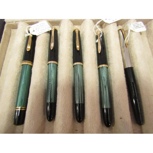 1302 - Four Pelikan fountain pens, various models all with 14c nibs together a Conway Steward 67 fountain p... 