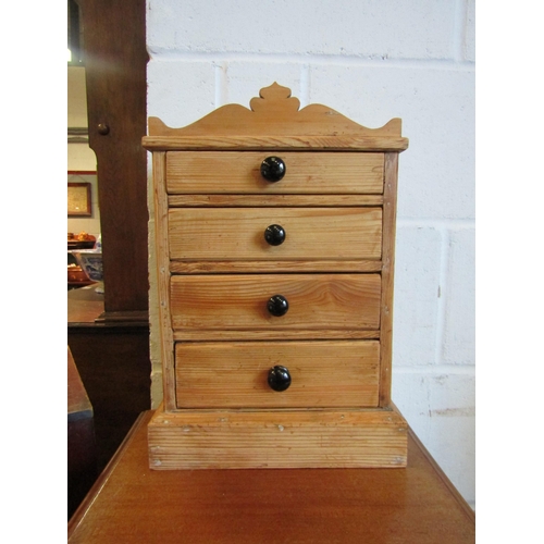 1014 - A pine four drawer table top chest, 41cm tall x 29cm wide x 17cm deep