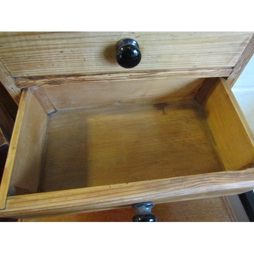 1014 - A pine four drawer table top chest, 41cm tall x 29cm wide x 17cm deep