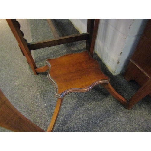 1017 - A two tier occasional table on outswept legs, 60cm tall x 45cm wide       (E) £10-15