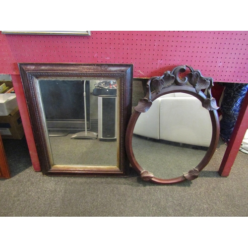 1076 - Two early 20th Century wall mirrors, one with carved leaf design