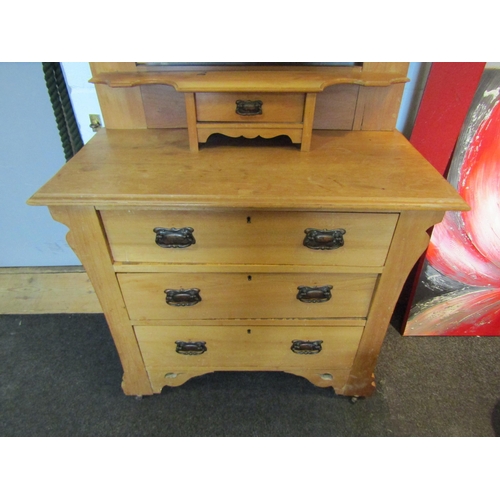 1090 - A circa 1900 satin walnut dressing chest of three drawers on castors, 154cm tall x 92cm wide x 44cm ... 