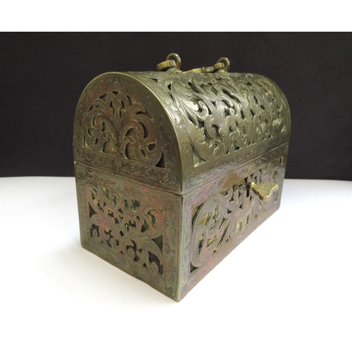 6336 - A domed shaped pierced brass velvet lined perfume casket containing three fitted cut glass perfume b... 